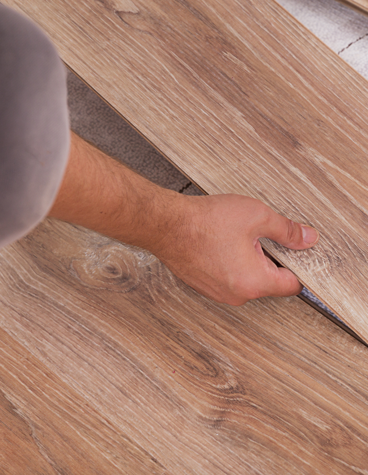 hardwood closeup with hands. 